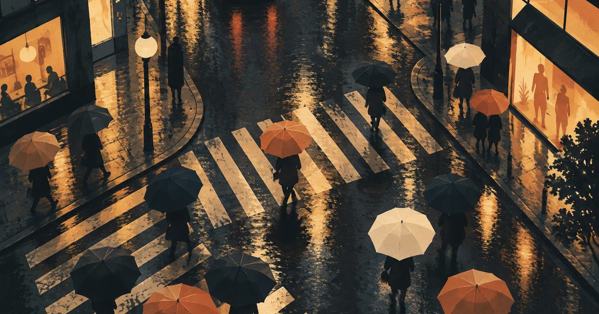 A rainy city crossing at night with umbrellas seen from above